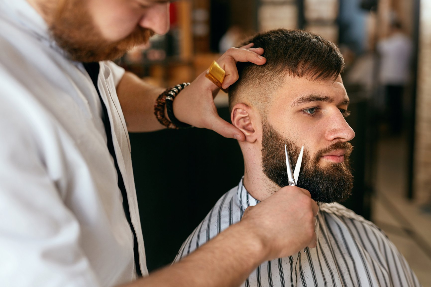 Beard Cut In Barber Shop. Barber Cutting Beard